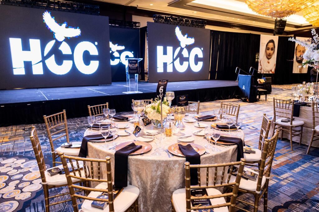 Corporate events company gala setup with custom lighting and elegant décor by EB Inc