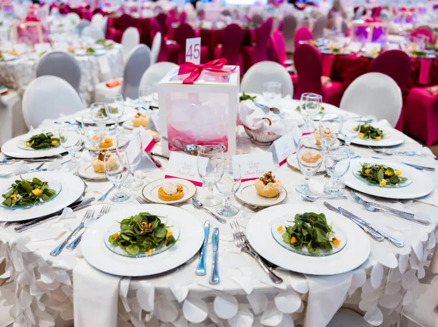 event table layout with round tables for a nonprofit luncheon in Houston