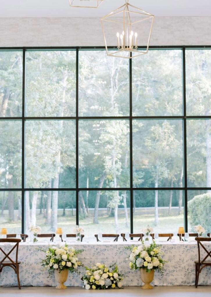 Elegant head table setup showcasing professional event rentals, illustrating how to choose an event rental company for a refined Houston event