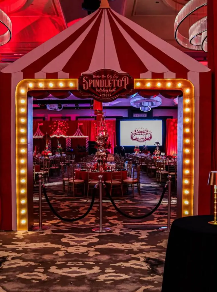 Circus-themed corporate event showcasing event rentals cost Houston planners consider when budgeting for large-scale events