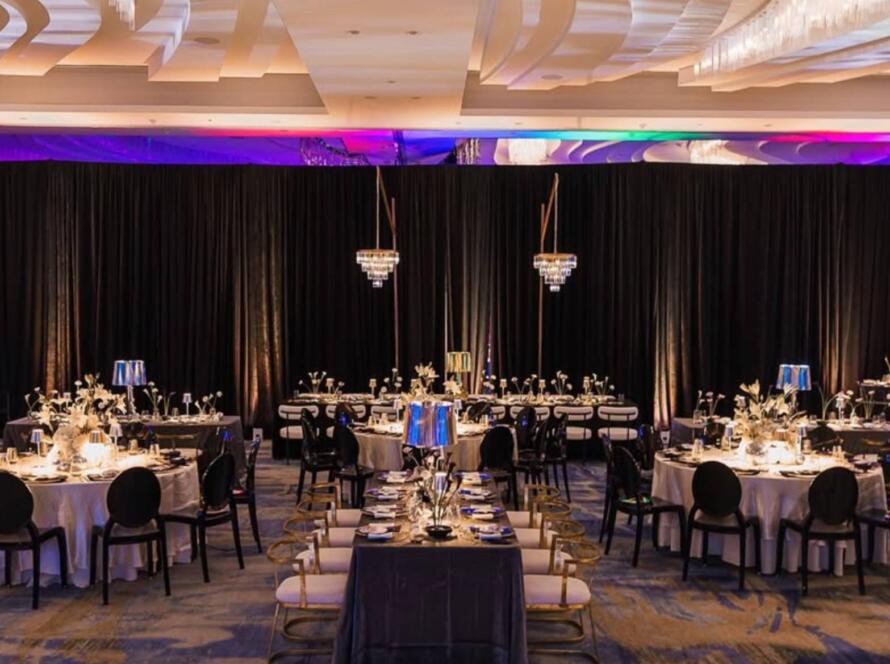 corporate event layout Houston banquet seating round tables and stage design