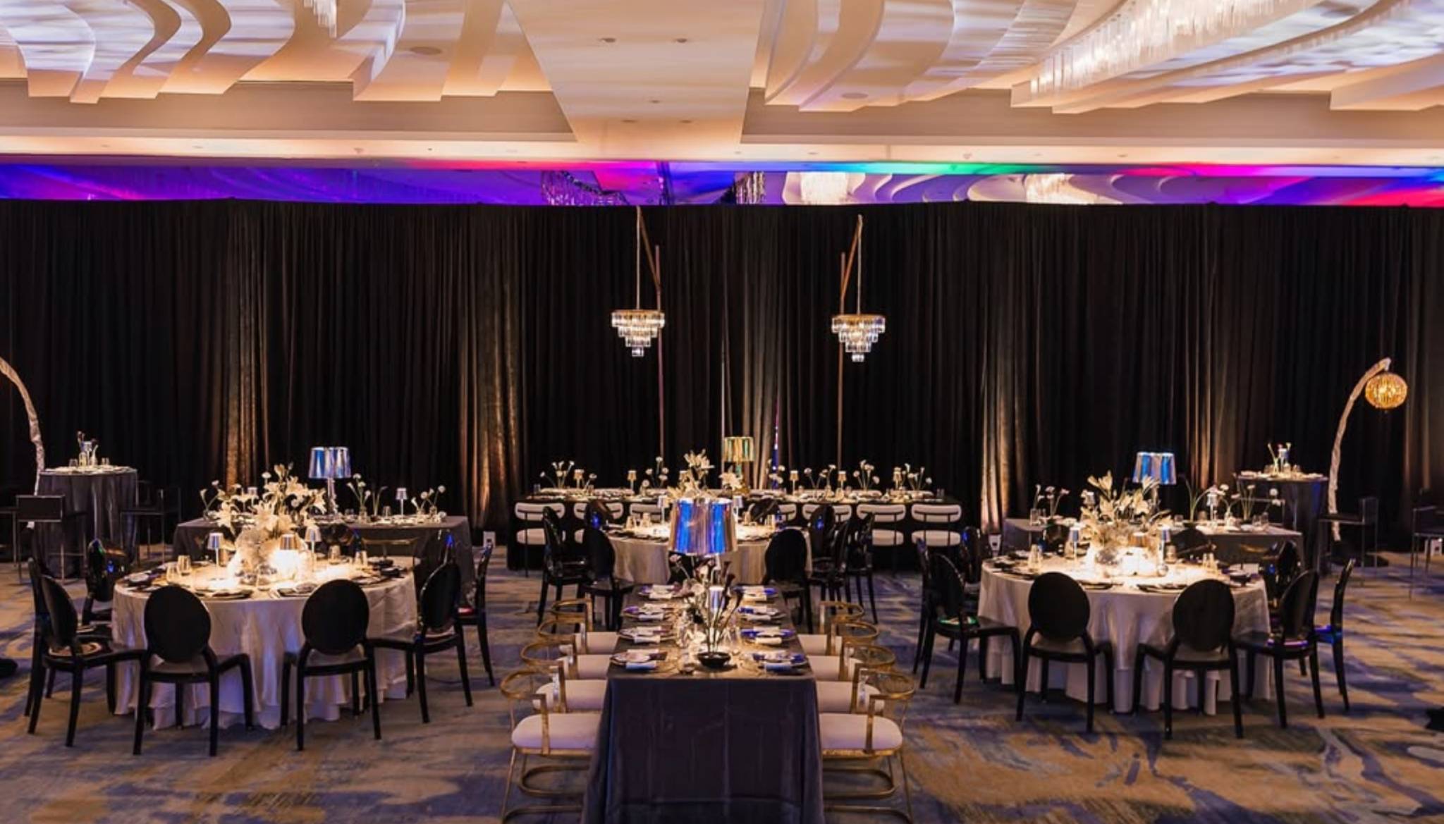 corporate event layout Houston banquet seating round tables and stage design