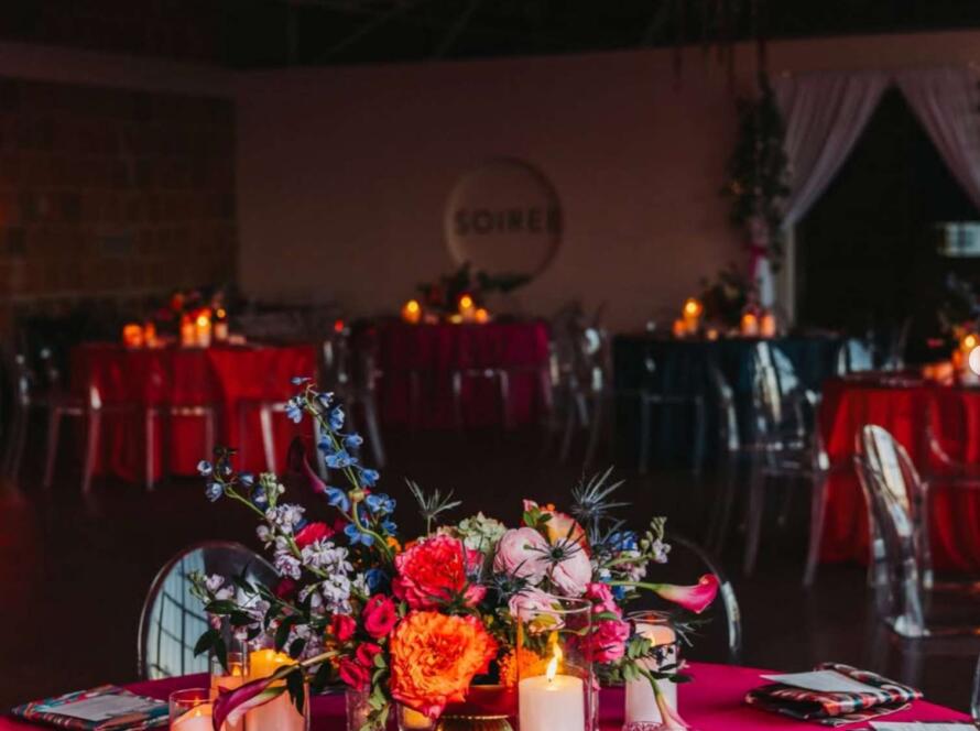 corporate event table decor Houston with linens, candles, and floral setup reflecting event rental pricing Houston