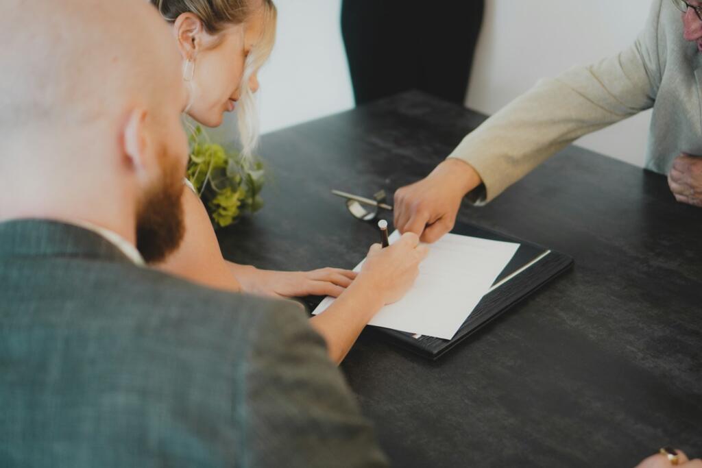 Client reviewing event rental contracts and deposit terms with Houston event rental company
