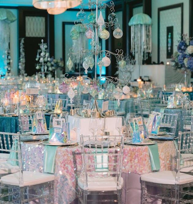 Luxury event design with elegant lighting and upscale table settings in Houston