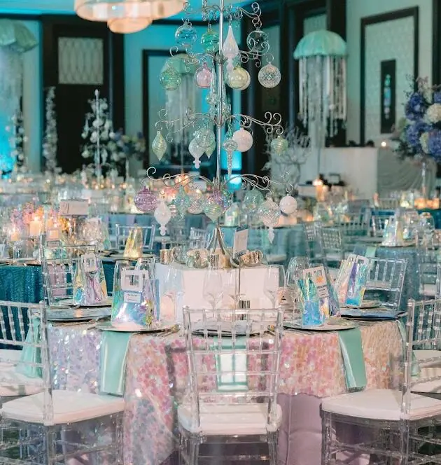 Luxury event design with elegant lighting and upscale table settings in Houston