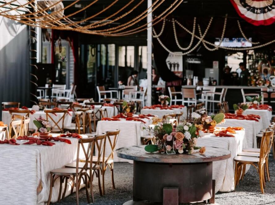 Corporate Event Production Houston event setup with tables, seating, lighting, and staging